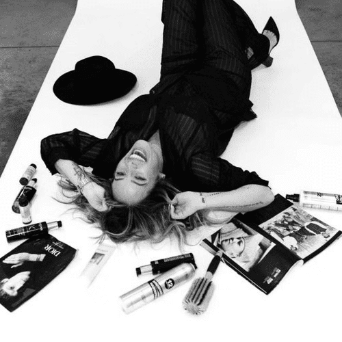Portrait of Christina Niell, a professional stylist at Salon CG, showcasing their expertise and style.
