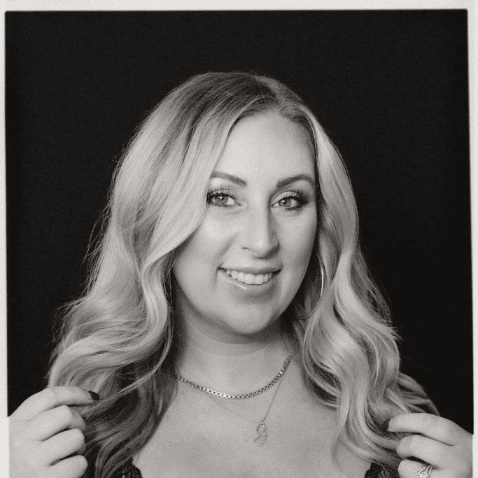 Portrait of Ferris Nardone, a professional stylist at Salon CG, showcasing their expertise and style.