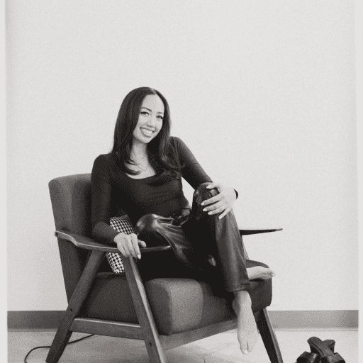 Portrait of Meileen (“Mei”) Ramun, a professional stylist at Salon CG, showcasing their expertise and style.