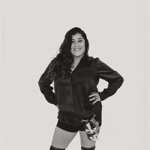 Portrait of Jennifer Colon, a professional stylist at Salon CG, showcasing their expertise and style.