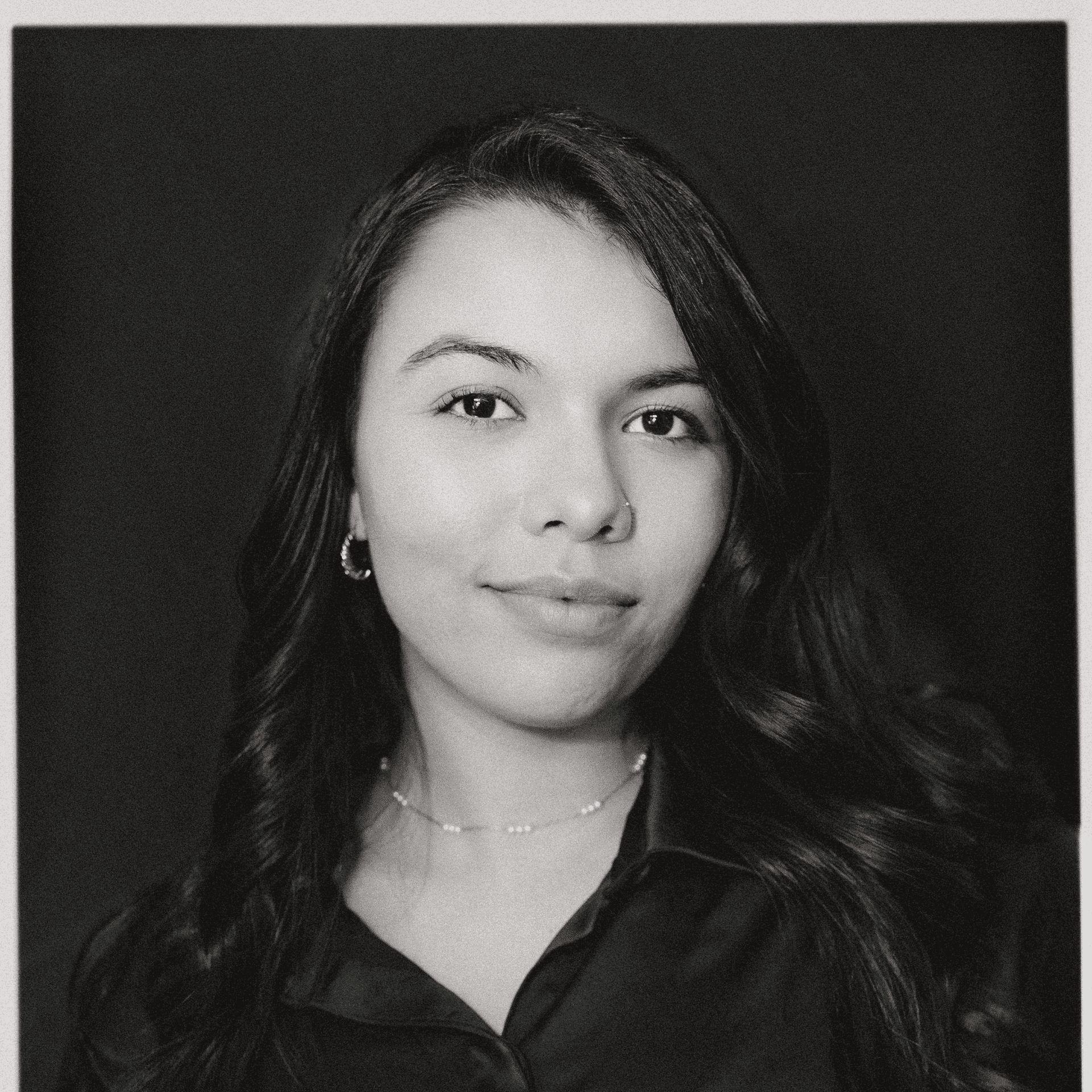Portrait of Joarle Galan, a professional stylist at Salon CG, showcasing their expertise and style.